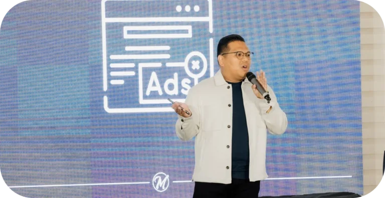 Speaker presenting about ads on stage